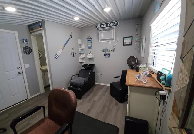 a view of a workspace with furniture and toys