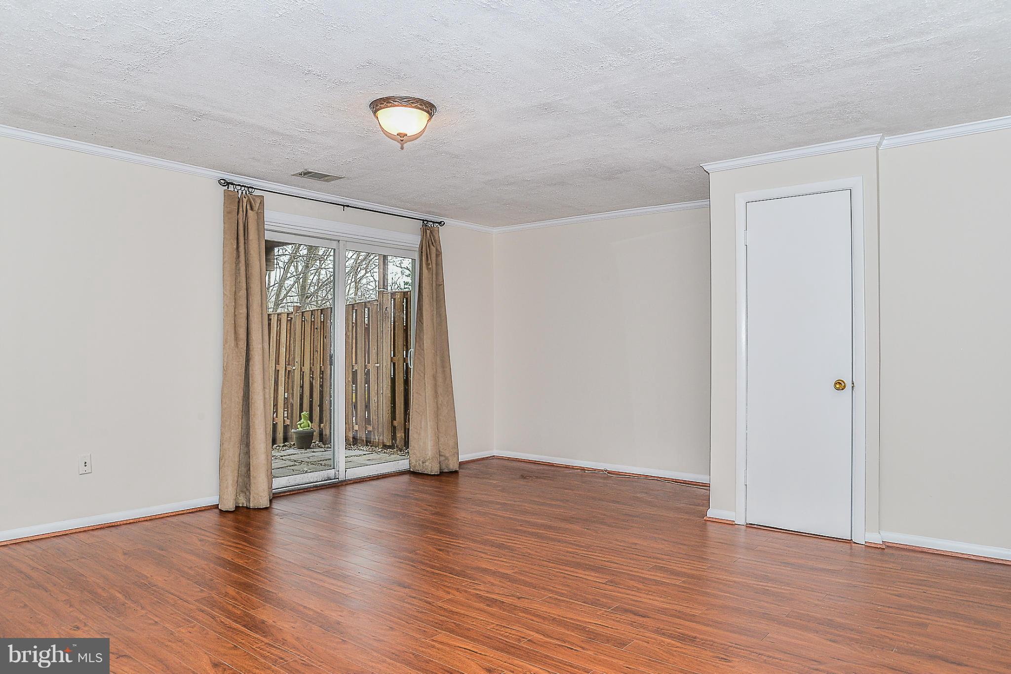 10972 Granby Court Reston, VA 20191 - Photo 21 of 30 Lower Level Rec Room/ Laminate wood like Floors