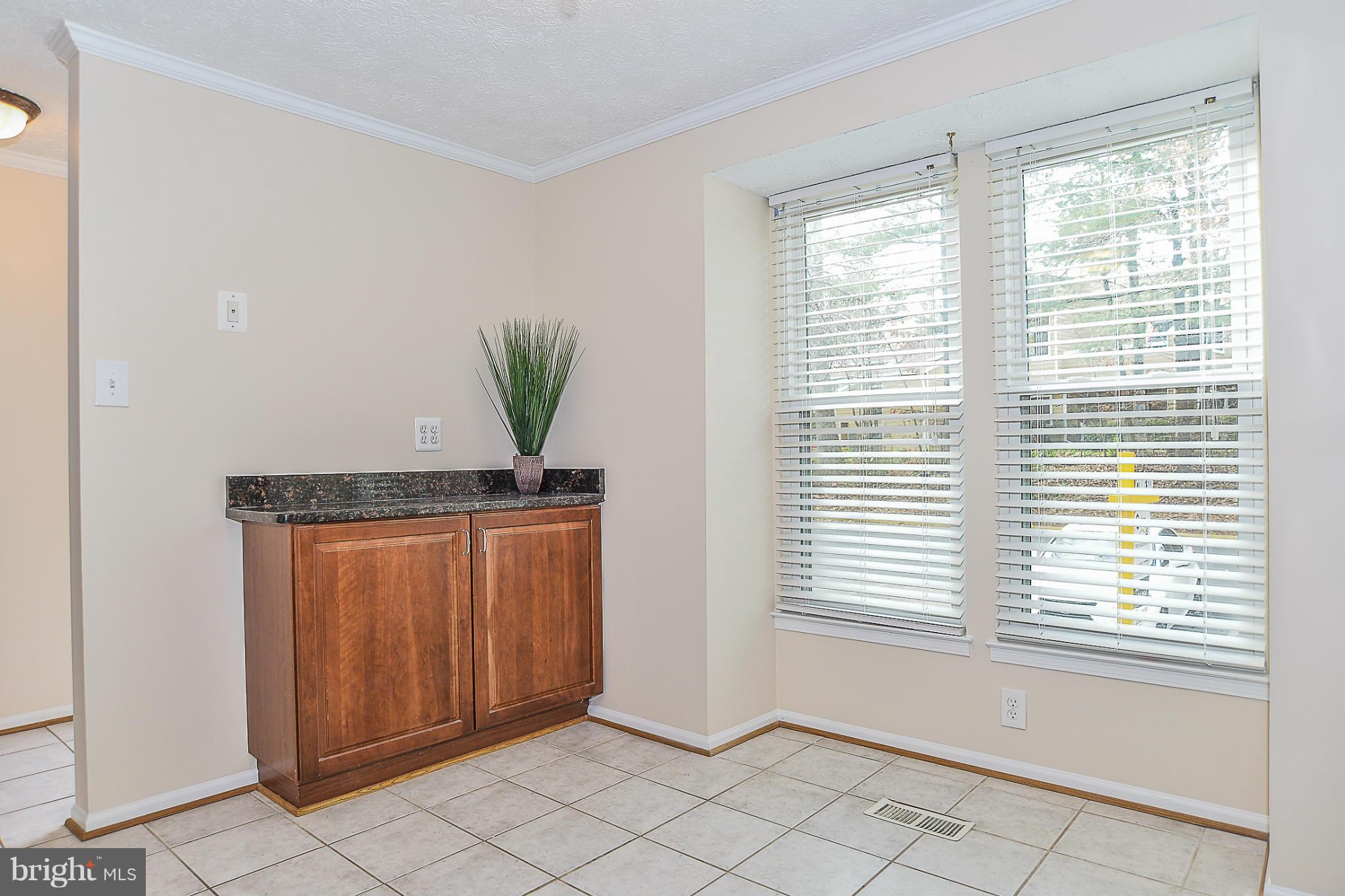 10972 Granby Court Reston, VA 20191 - Photo 6 of 30 Kitchen, more Cabinets and tons of light