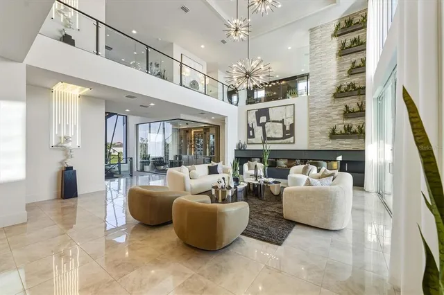 a kitchen with a dining table chairs sink and stove