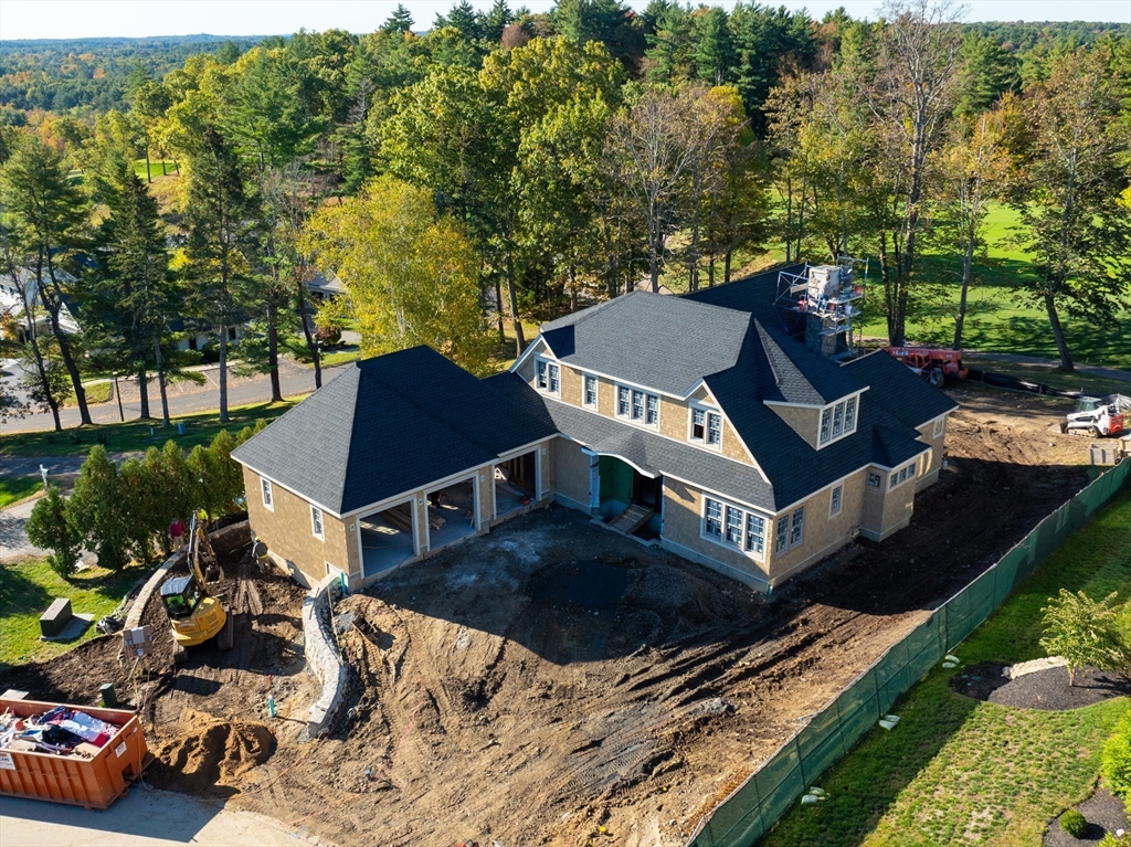 30 Buttonwood, Unit 30 Ipswich, MA 01938 - Photo 2 of 13 a view of a patio with table and chairs and potted plants