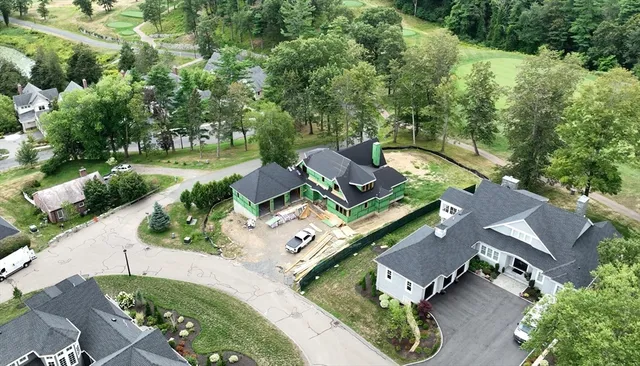an aerial view of a house with a garden