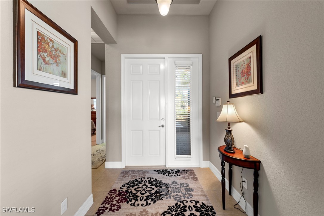 11652 Meadowrun Circle Fort Myers, FL 33913 - Photo 3 of 38 a bedroom with a bed and a window