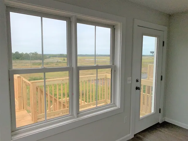 a view of a large window with a balcony