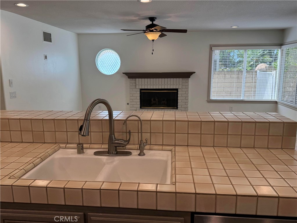 27346 Blueridge Drive Valencia, CA 91354 - Photo 13 of 44 a bathroom with a sink a vanity and a shower
