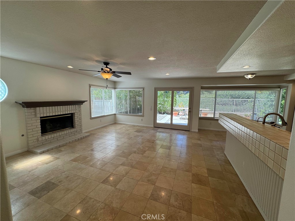 27346 Blueridge Drive Valencia, CA 91354 - Photo 24 of 44 a living room with furniture and a fireplace