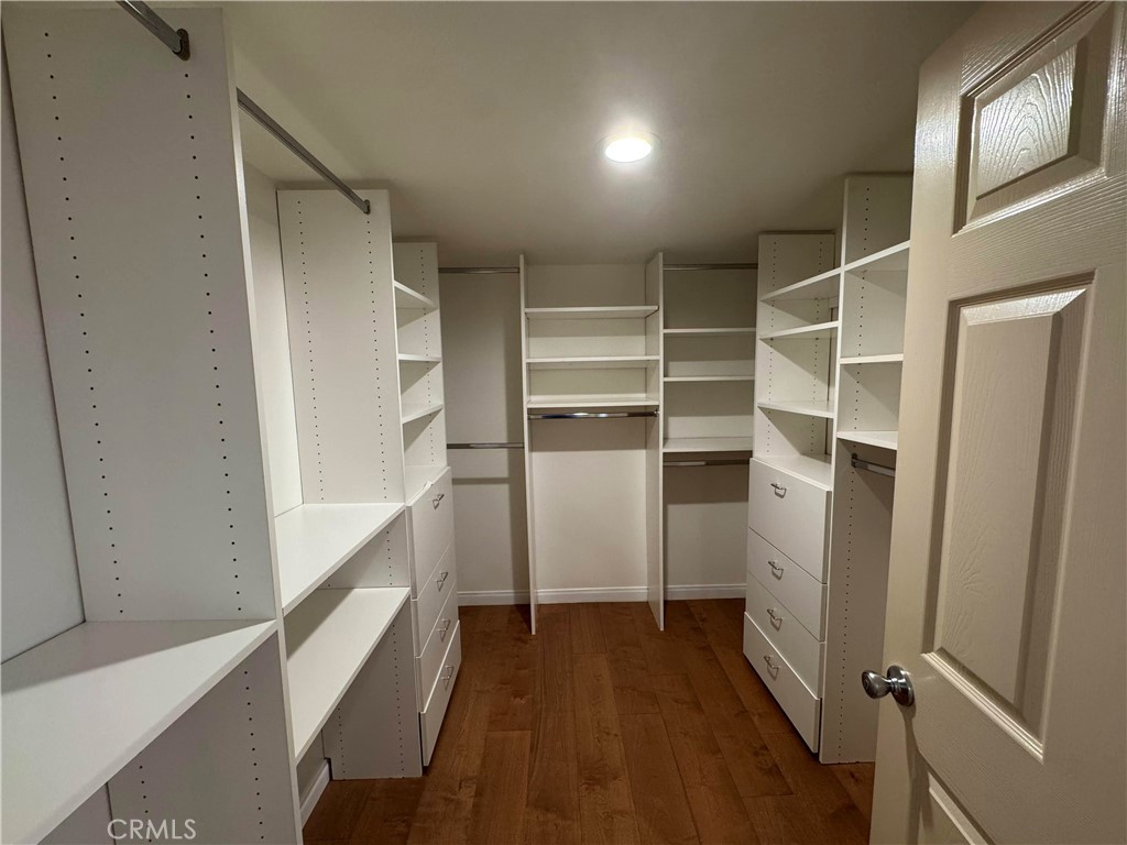 27346 Blueridge Drive Valencia, CA 91354 - Photo 30 of 44 a view of walk in closet with empty racks