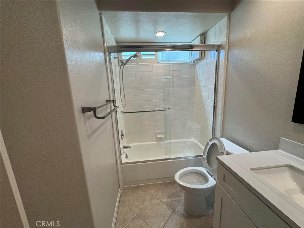 27346 Blueridge Drive Valencia, CA 91354 - Photo 41 of 44 a bathroom with a granite countertop bathtub shower sink vanity and toilet