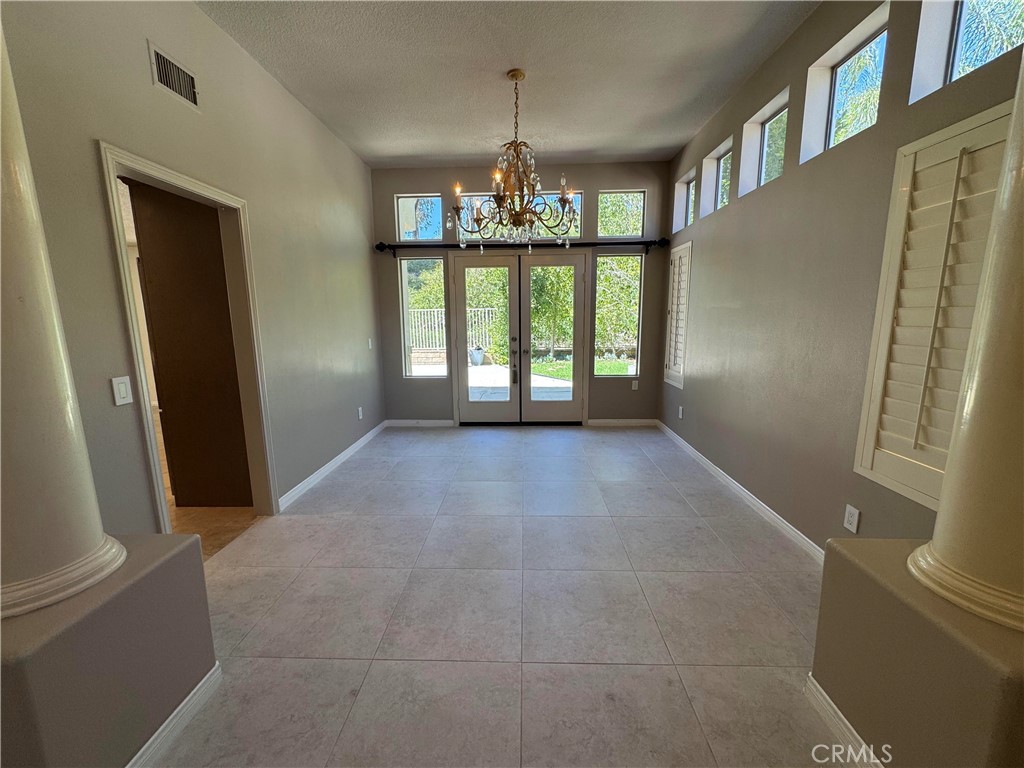 27346 Blueridge Drive Valencia, CA 91354 - Photo 8 of 44 a view of an empty room with a window