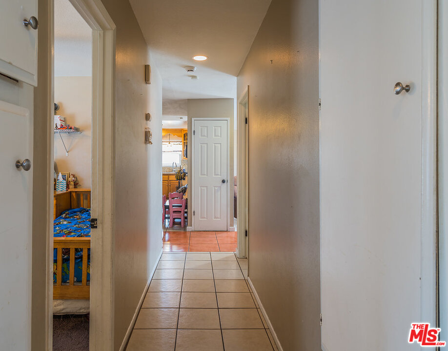 983 East Margarita Road Rialto, CA 92376 - Photo 20 of 23 a view of a hallway to a livingroom and a window
