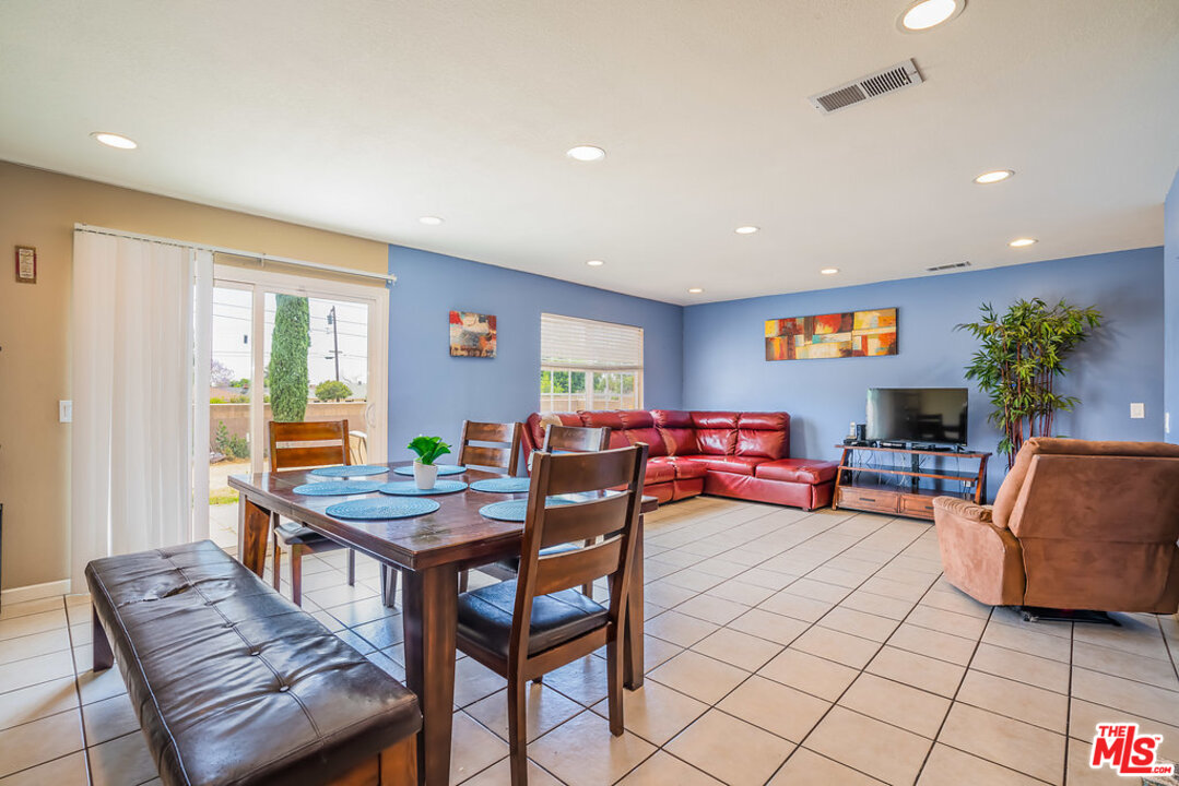 983 East Margarita Road Rialto, CA 92376 - Photo 7 of 23 a living room with furniture and a table