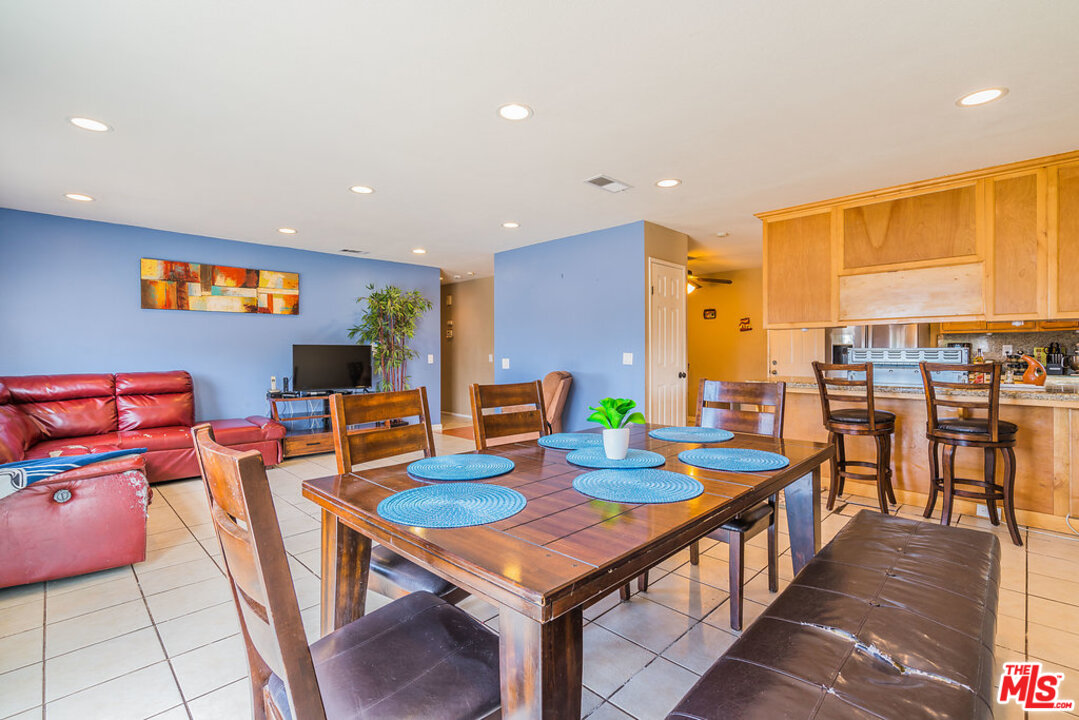 983 East Margarita Road Rialto, CA 92376 - Photo 8 of 23 a view of a dining room with furniture window and outside view