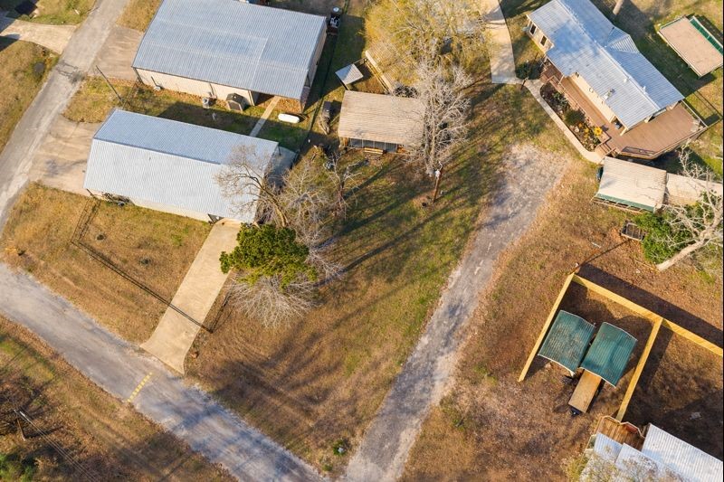 31 Kokomo Run Point Blank, TX 77364 - Photo 3 of 10 front view of a house with a yard