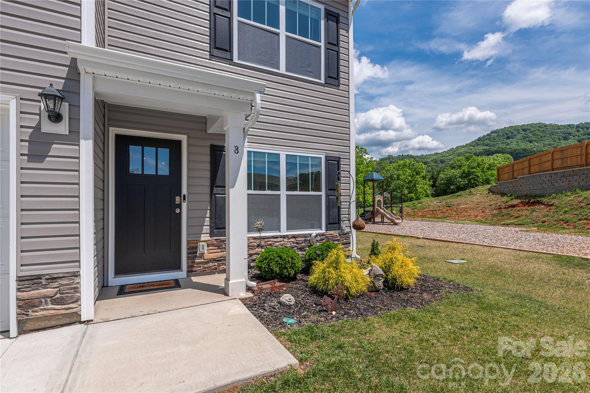 8 Madelyn Drive Clyde, NC 28721 - Photo 5 of 43 a front view of a house with a yard