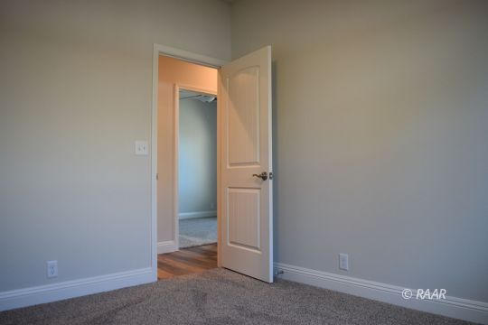 556 South Alvord Street Ridgecrest, CA 93555 - Photo 19 of 28 an empty room with a bathroom