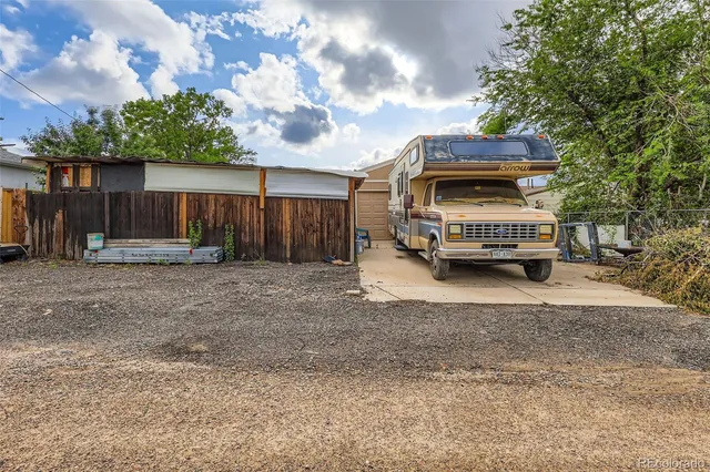 a car parked in front of a house