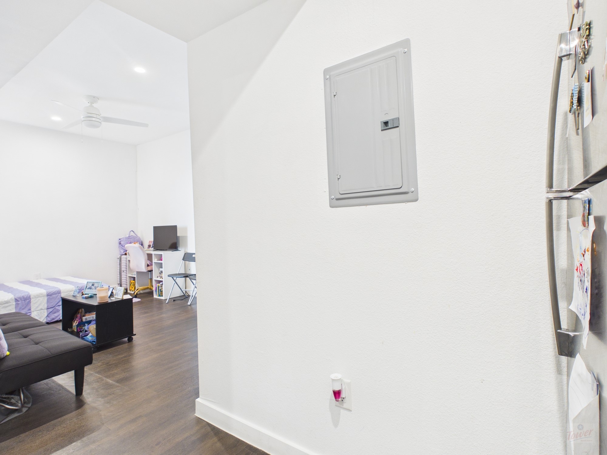 1010 West 26th Street, Unit 403 Austin, TX 78705 - Photo 3 of 6 a room with furniture and a window
