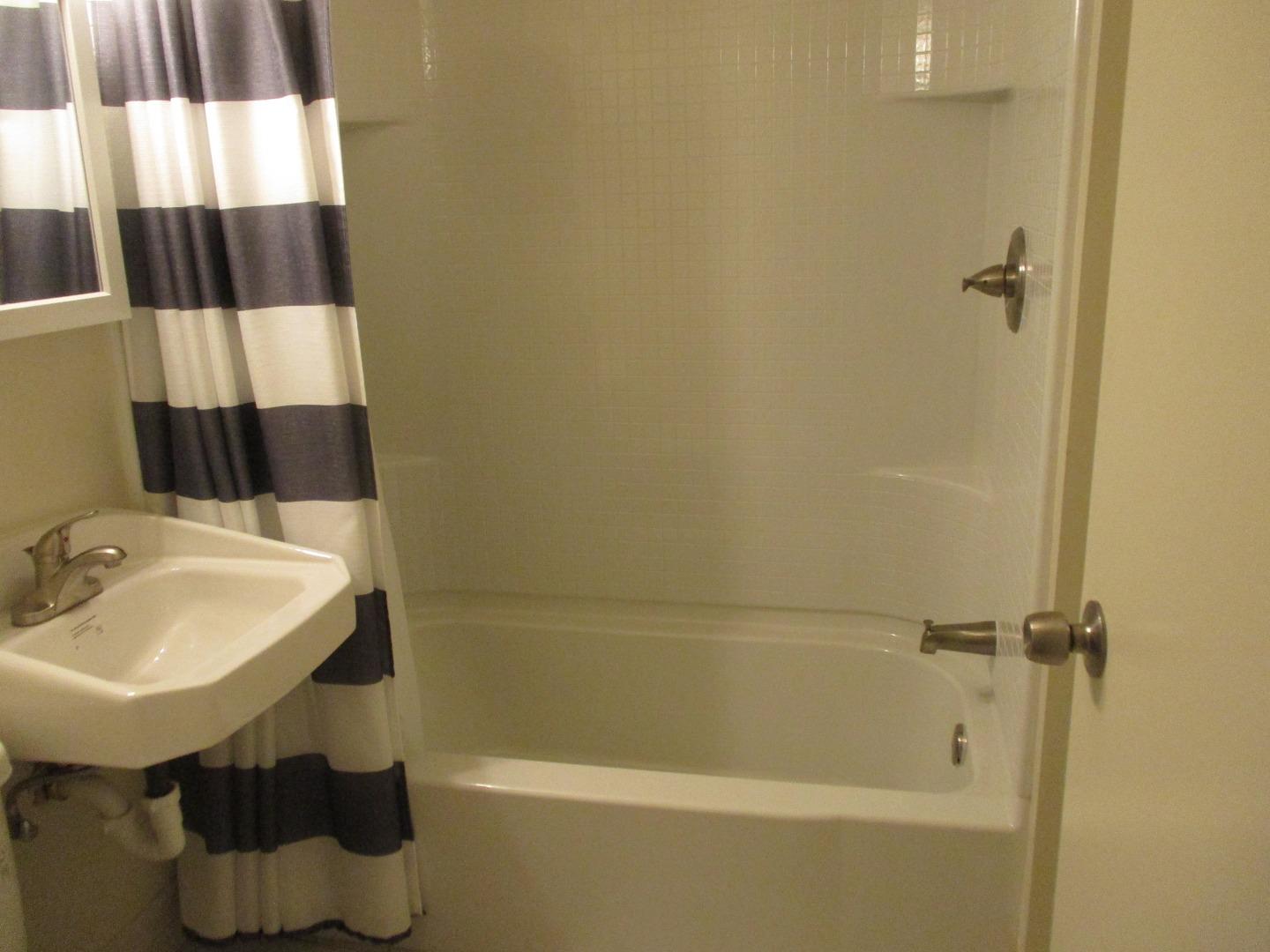 Murray Avenue Gilroy, CA 95020 - Photo 23 of 25 a bathroom with a sink a toilet and shower