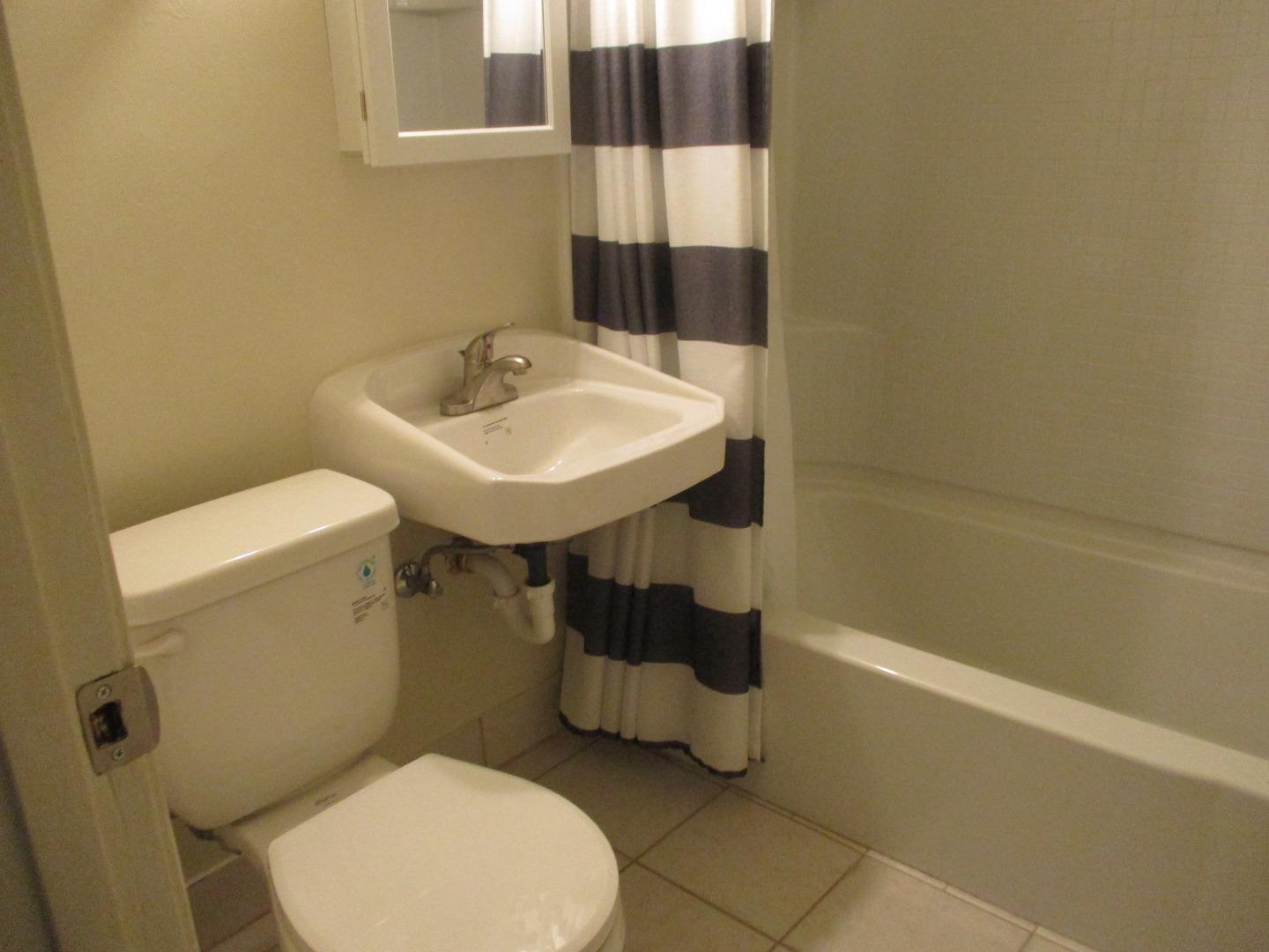 Murray Avenue Gilroy, CA 95020 - Photo 24 of 25 a bathroom with a sink a toilet and shower