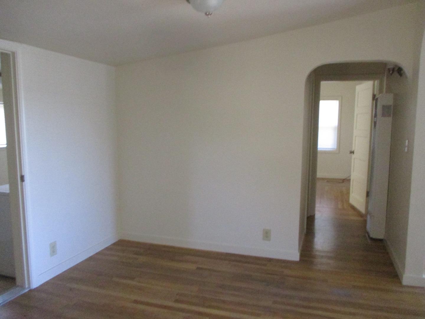 Murray Avenue Gilroy, CA 95020 - Photo 8 of 25 a view of an empty room and wooden floor