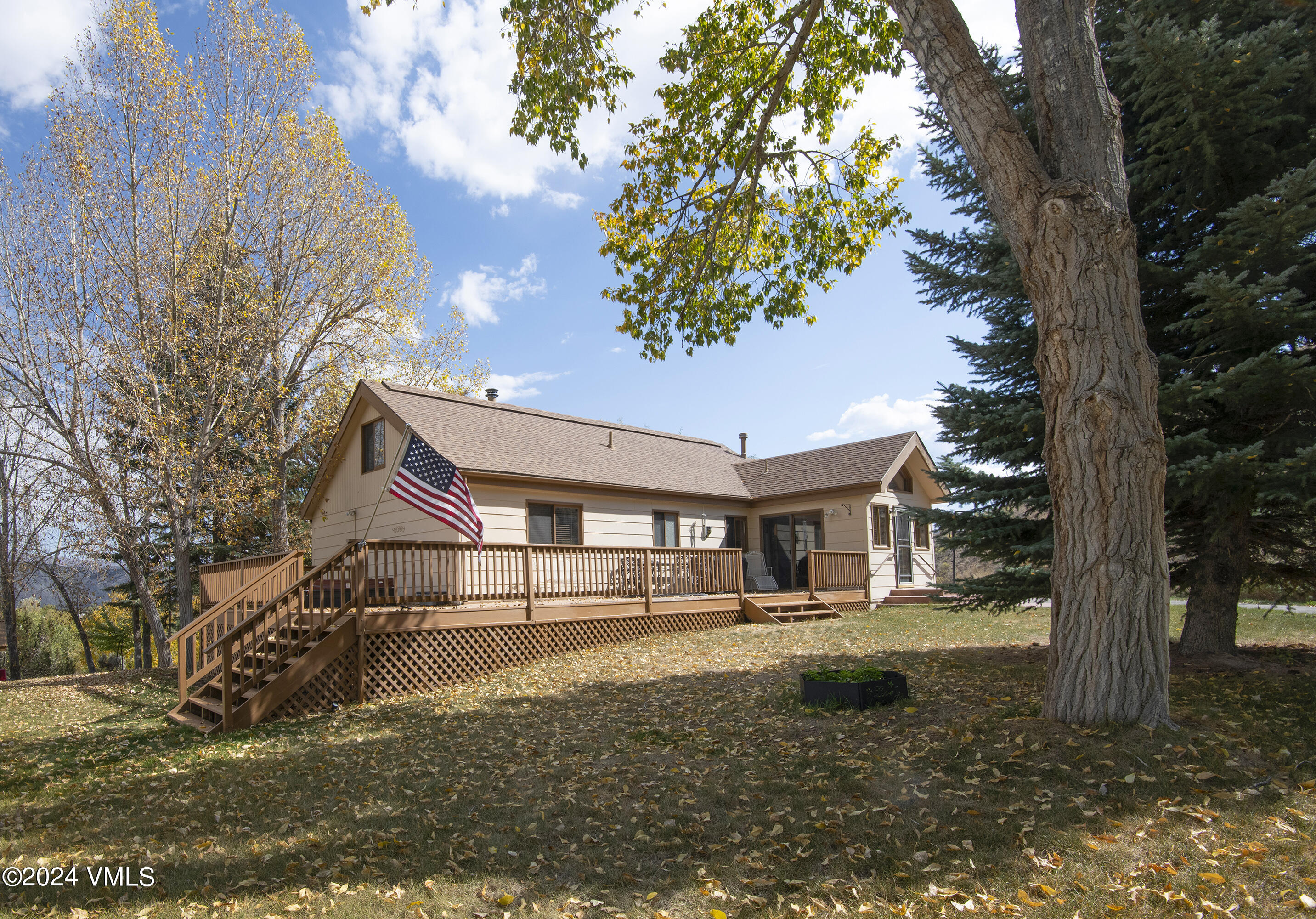 220 Beacon Road Gypsum, CO 81637 - Photo 2 of 12 a front view of a house with a yard