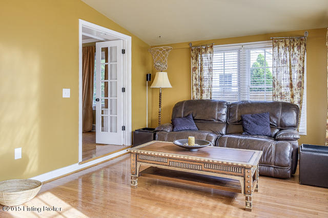 112 North Chadwick Road Bellemeade, KY 40222 - Photo 7 of 27 Family room has lots of light and windows