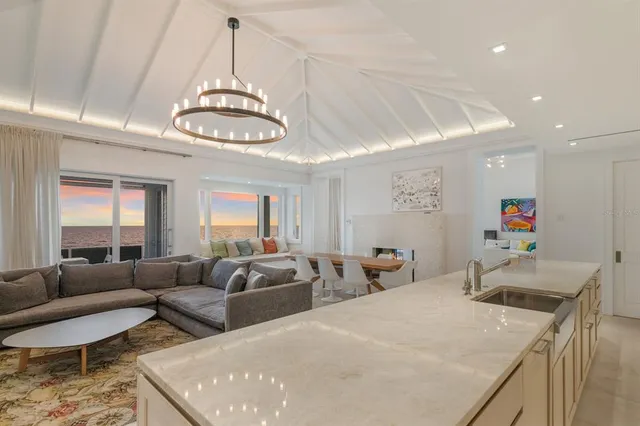 a kitchen with a sink and a white cabinets