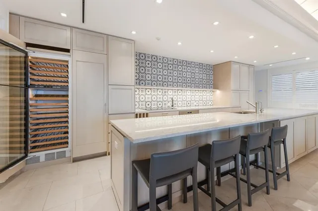 a bathroom with a sink double vanity and a mirror