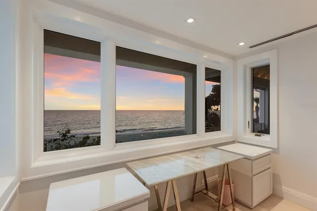 a bedroom with a bed and a mirror