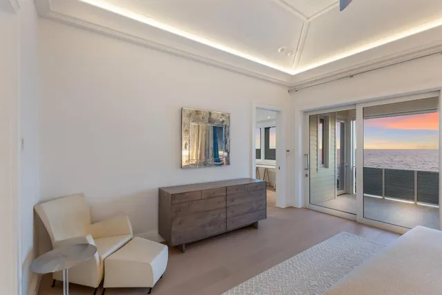a bathroom with a granite countertop sink toilet a mirror and shower