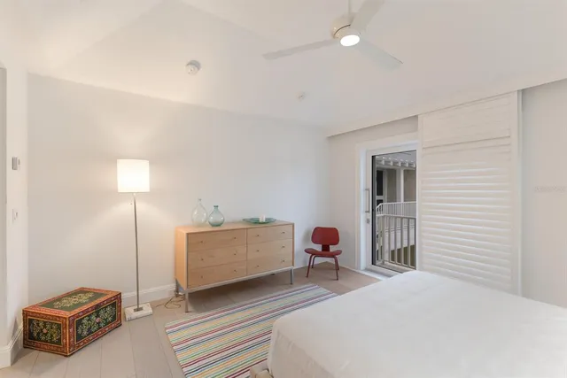 an aerial view of a house with a yard and potted plants