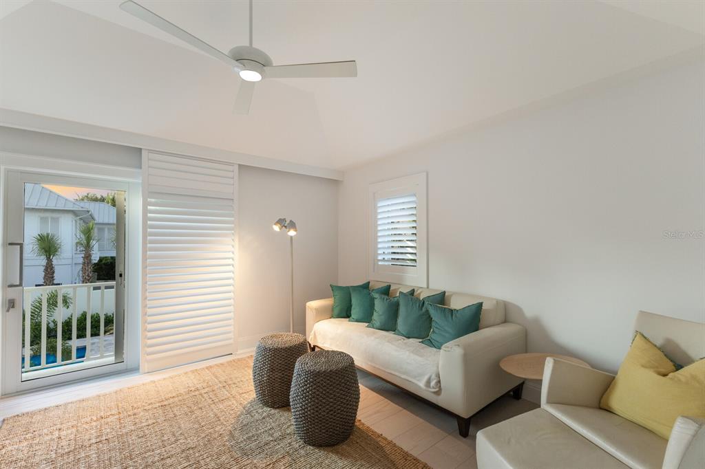 2031 Shore Lane Boca Grande, FL 33921 - Photo 46 of 100 a living room with furniture and a window