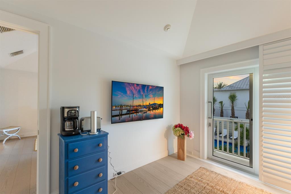 2031 Shore Lane Boca Grande, FL 33921 - Photo 47 of 100 a living room with furniture and a flat screen tv