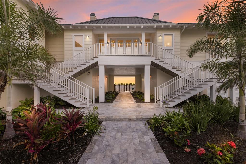 2031 Shore Lane Boca Grande, FL 33921 - Photo 5 of 100 a front view of a house with garden