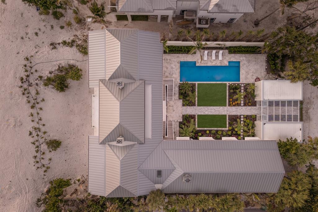 2031 Shore Lane Boca Grande, FL 33921 - Photo 61 of 100 an aerial view of a house with a yard and potted plants
