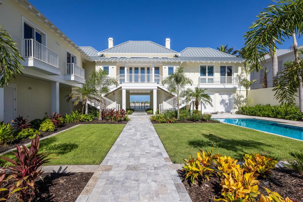 2031 Shore Lane Boca Grande, FL 33921 - Photo 66 of 100 a front view of a house with a yard