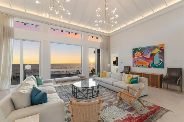 a view of a livingroom with furniture and window