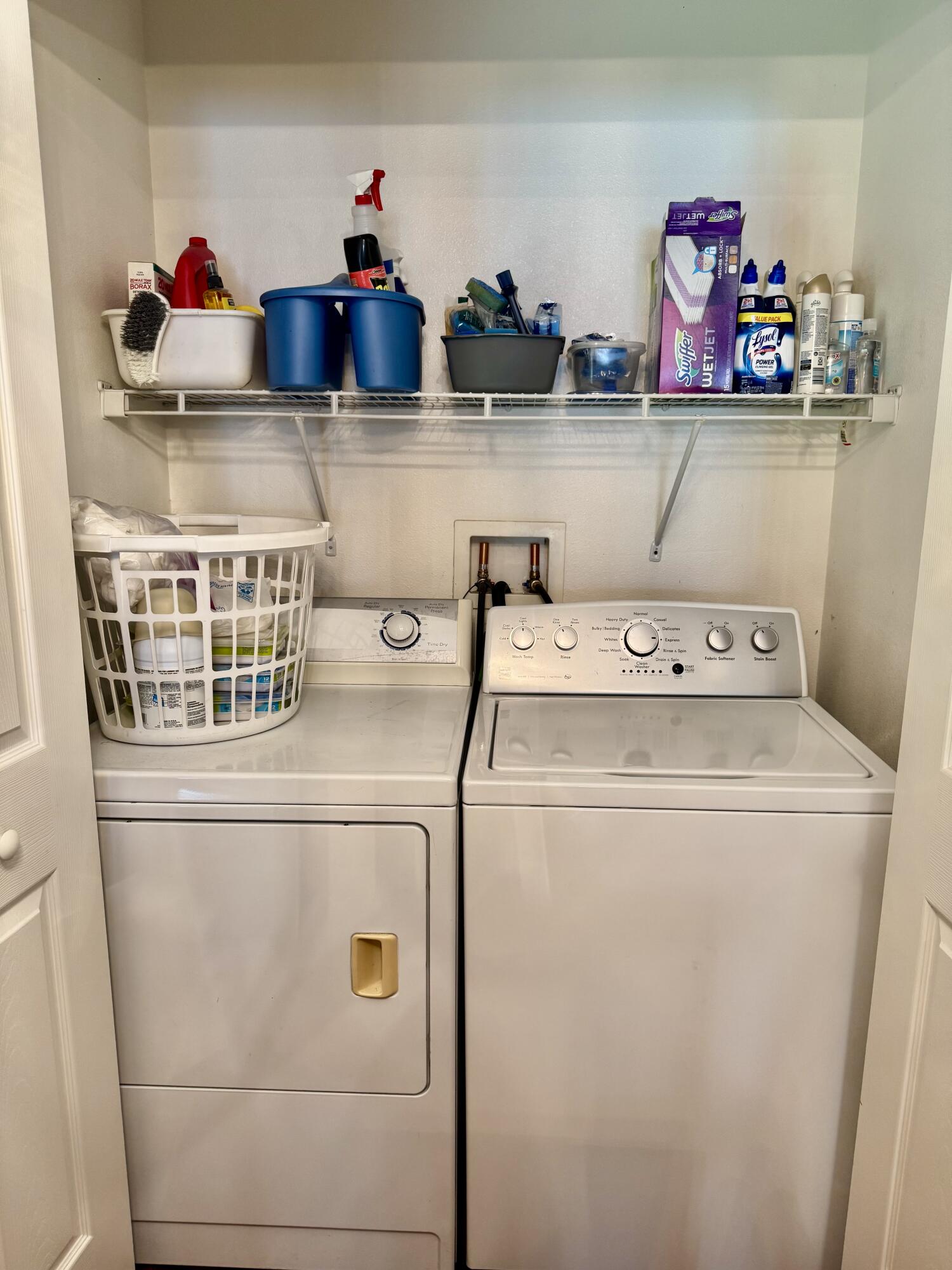 527 Southeast 38th Avenue Okeechobee, FL 34974 - Photo 27 of 30 a utility room with dryer and washer