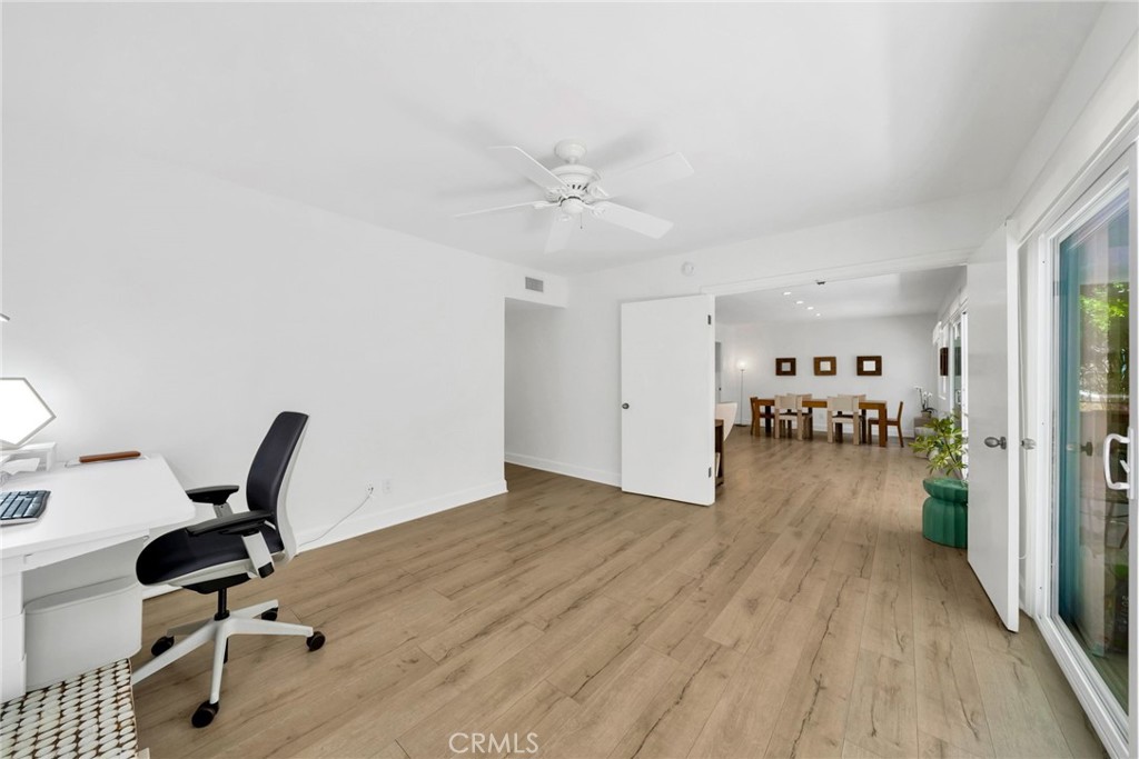 7259 Hillside Avenue, Unit 102 Los Angeles, CA 90046 - Photo 16 of 37 a view of a workspace with wooden floor