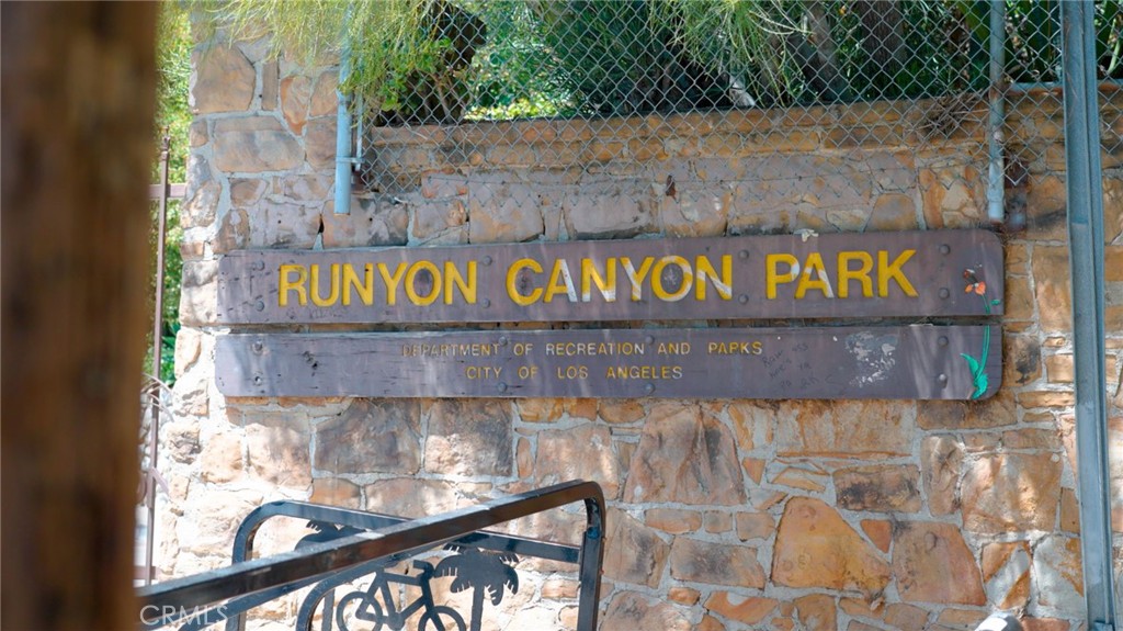 7259 Hillside Avenue, Unit 102 Los Angeles, CA 90046 - Photo 32 of 37 a signage on a brick wall