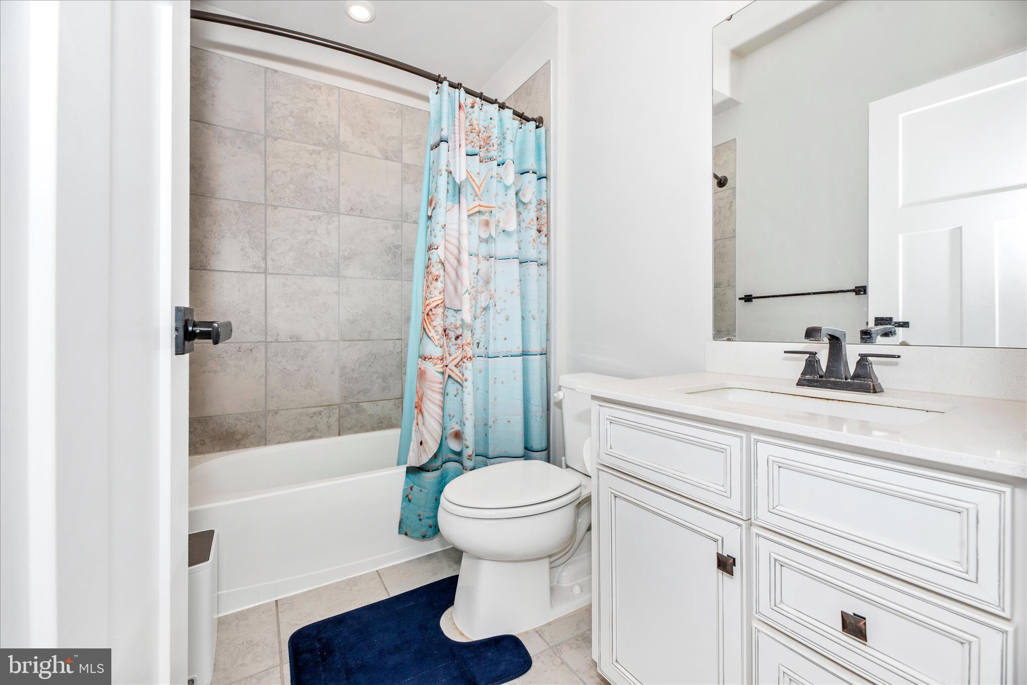 6042 Fallfish Court New Market, MD 21774 - Photo 37 of 77 a bathroom with a sink a toilet and a bathtub