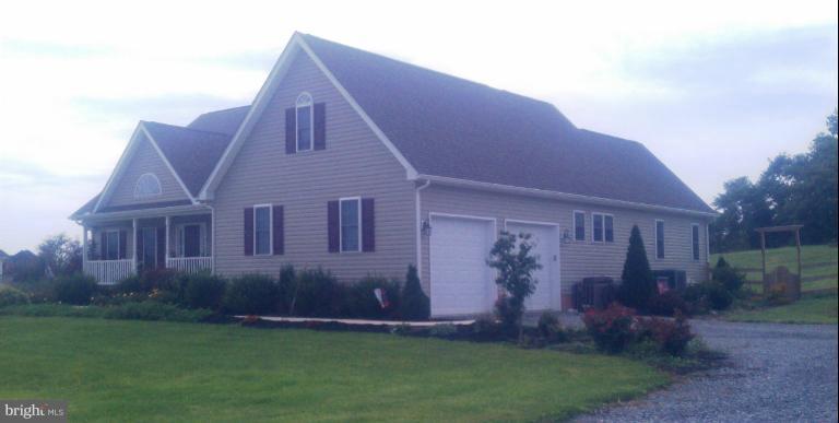 391 Co Rte 1/5 Falling Waters, WV 25419 - Photo 2 of 12 Garage Side
