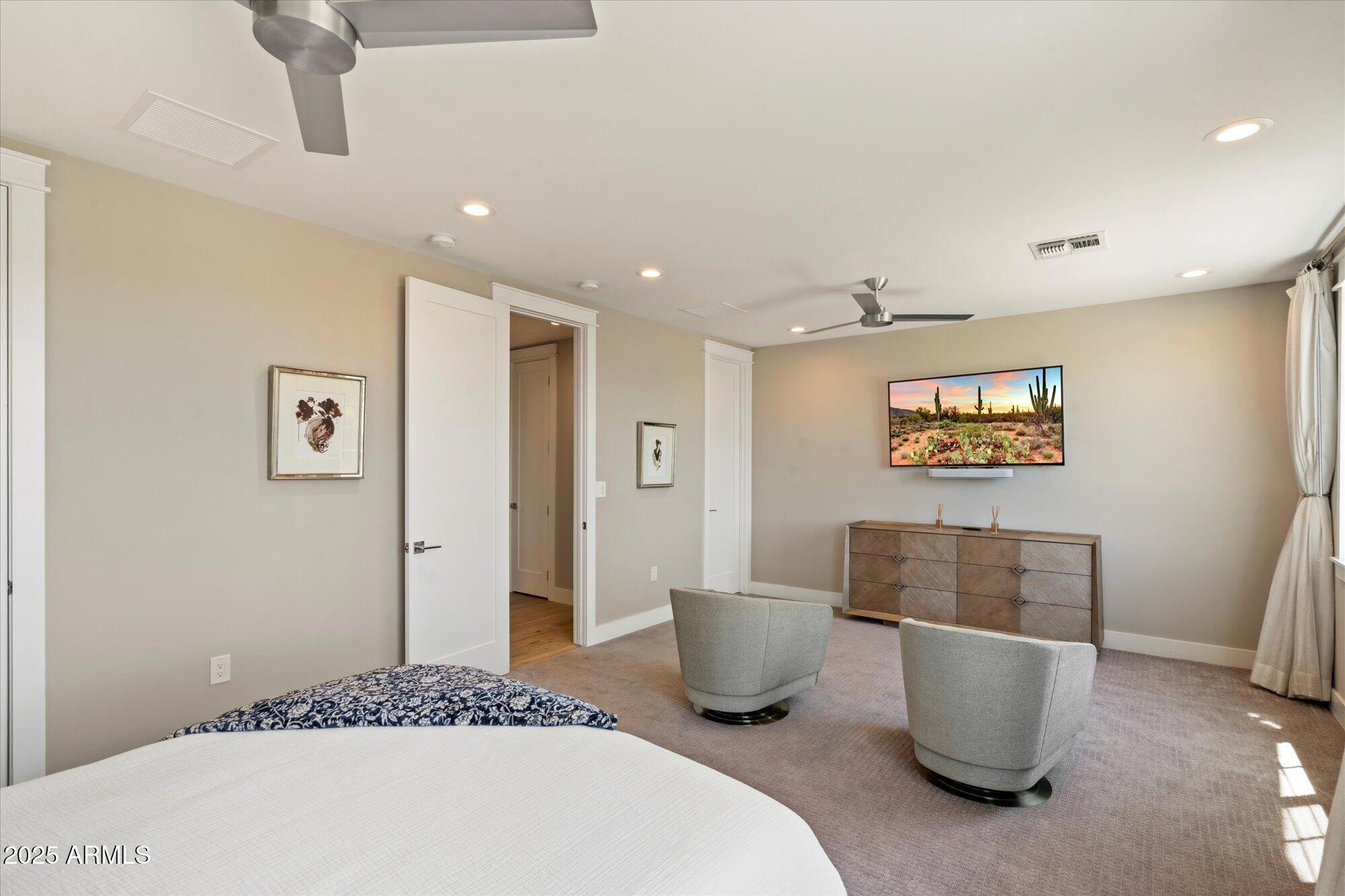 3810 East Devonshire Avenue Phoenix, AZ 85018 - Photo 20 of 34 a living room with a couch and a table