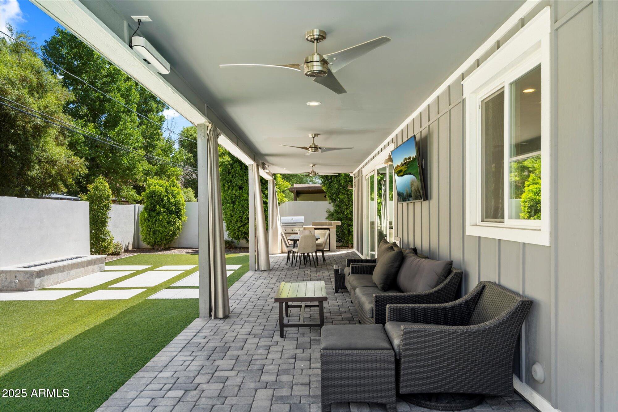 3810 East Devonshire Avenue Phoenix, AZ 85018 - Photo 25 of 34 a outdoor living space with furniture and garden view
