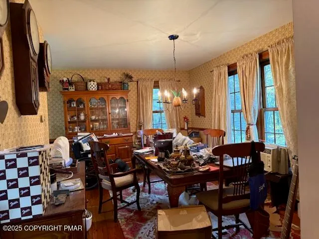 a view of a dining room with furniture