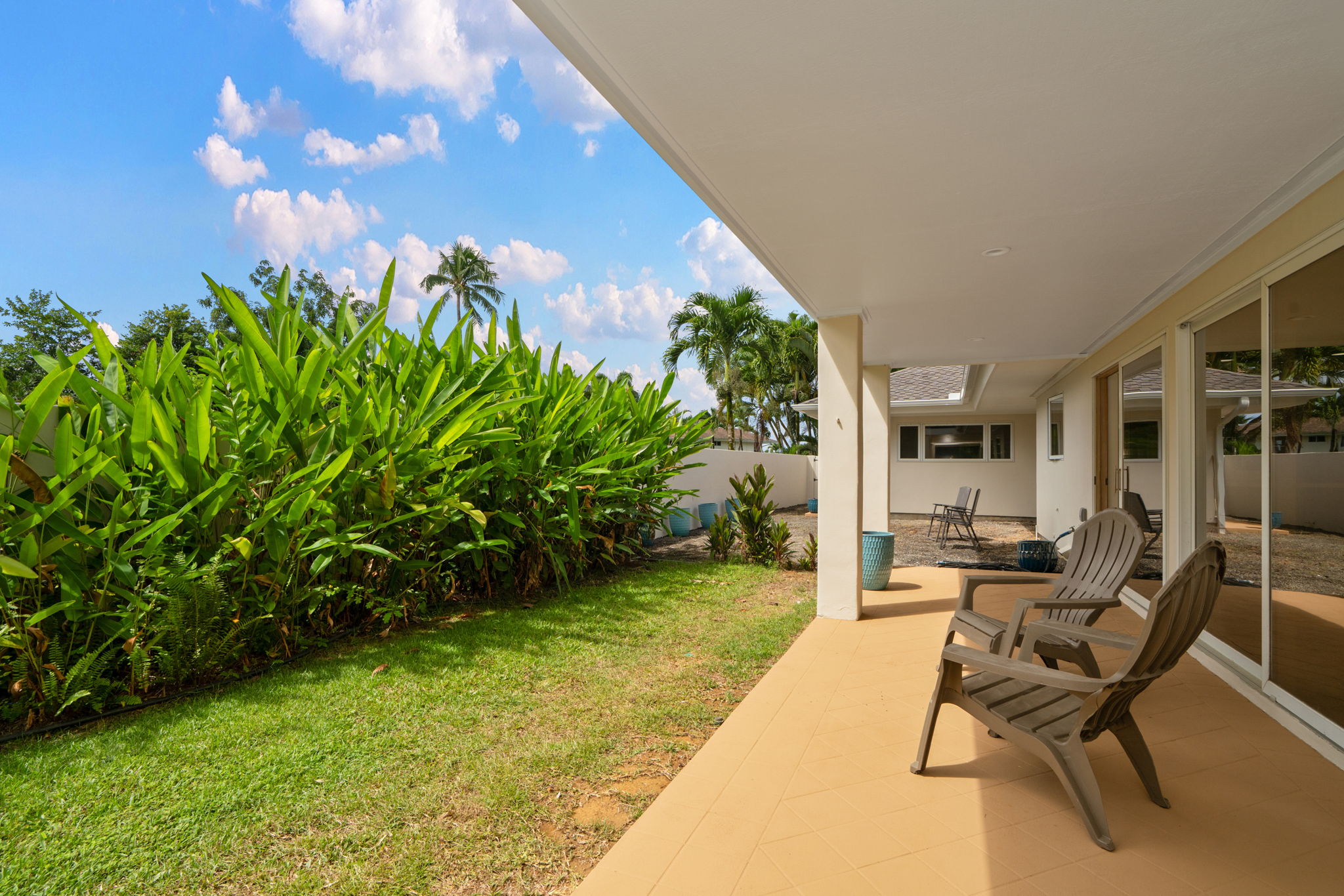 4179 Liholiho Road Princeville, HI 96722 - Photo 12 of 30 a view of a backyard with sitting area