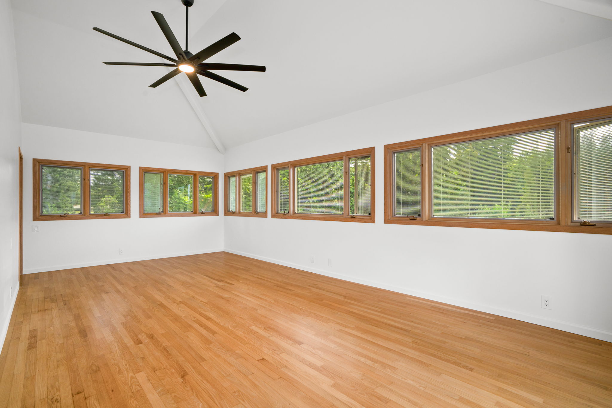 4179 Liholiho Road Princeville, HI 96722 - Photo 16 of 30 a view of an empty room with a window and wooden floor