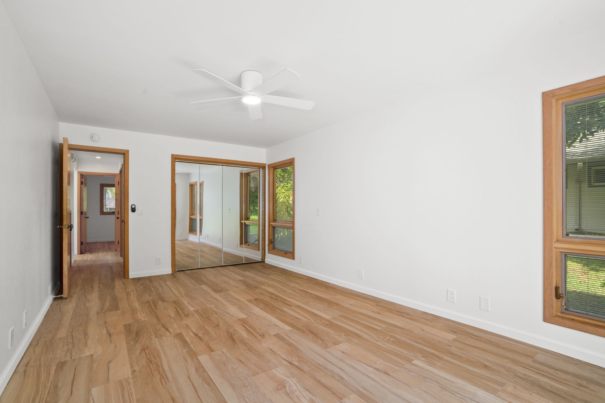 4179 Liholiho Road Princeville, HI 96722 - Photo 24 of 30 wooden floor in an empty room with a window