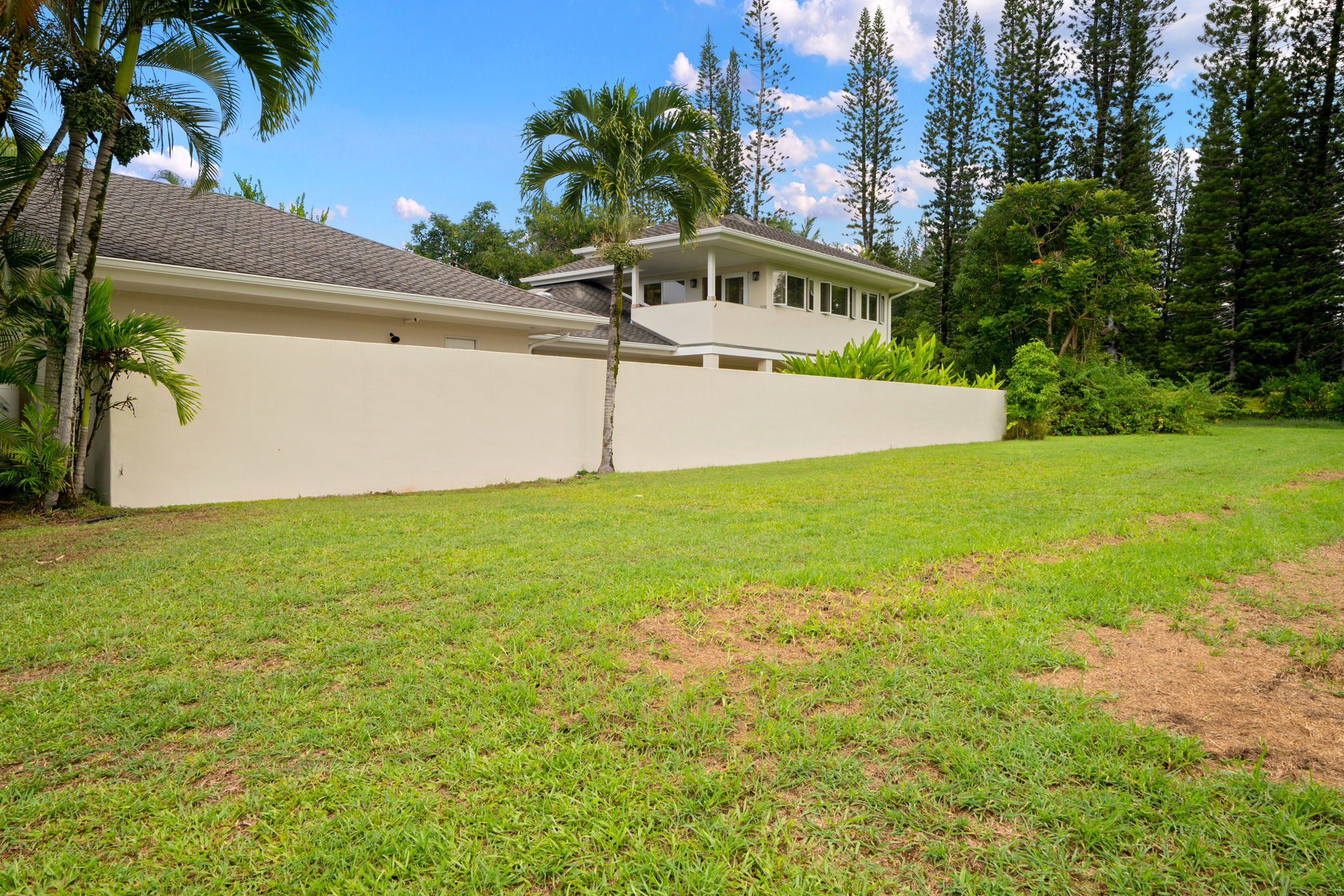 4179 Liholiho Road Princeville, HI 96722 - Photo 28 of 30 a view of a swimming pool with a yard