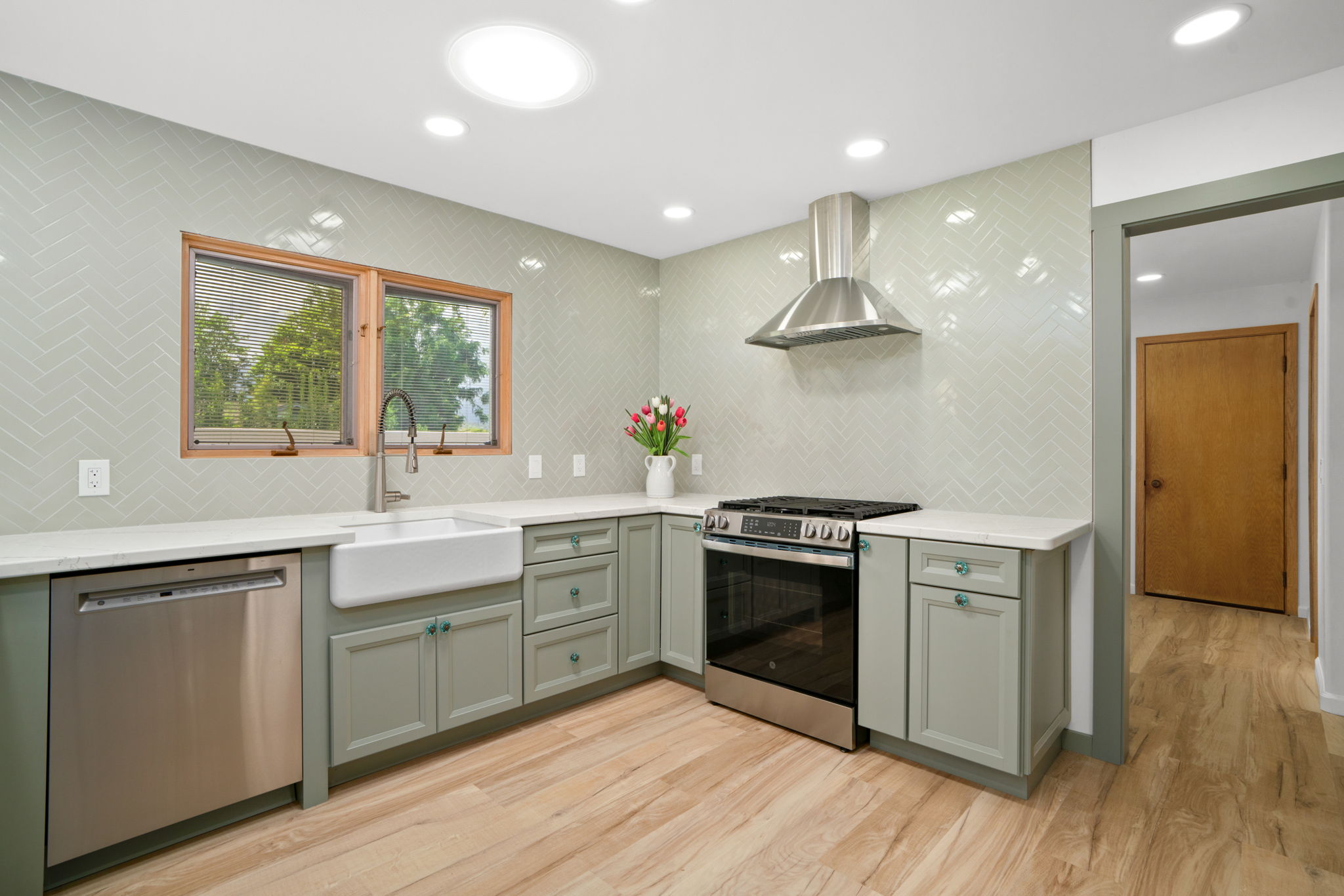 4179 Liholiho Road Princeville, HI 96722 - Photo 7 of 30 a kitchen with stainless steel appliances granite countertop a stove and a sink